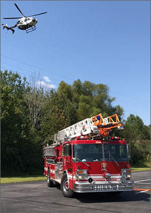 Fire Truck with helicopter overhead